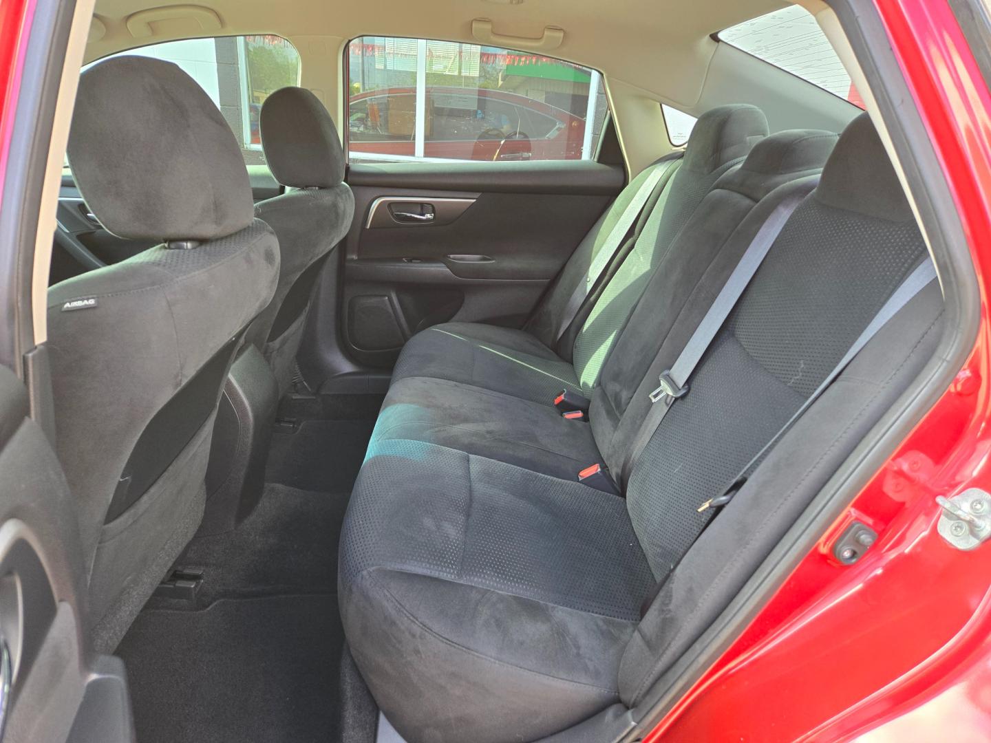 2015 Red Nissan Altima 2.5 S (1N4AL3AP9FC) with an 2.5L L4 DOHC 16V engine, Continuously Variable Transmission transmission, located at 503 West Court, Seguin, TX, 78155, (830) 379-3373, 29.568621, -97.969803 - 2015 Nissan Altima S with a 2.5L L4 DOHC 16V, Automatic, Tilt, Cruise, AM/FM/CD/AUX Stereo, Power Windows, Locks, Seats and Side Mirrors, Bluetooth, Automatic Headlights, Rear Defroster and more!! - Photo#6